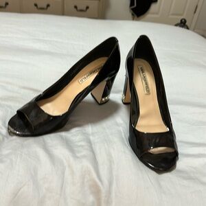 Karl Lagerfeld black patent heels with pearl encrusted heel.